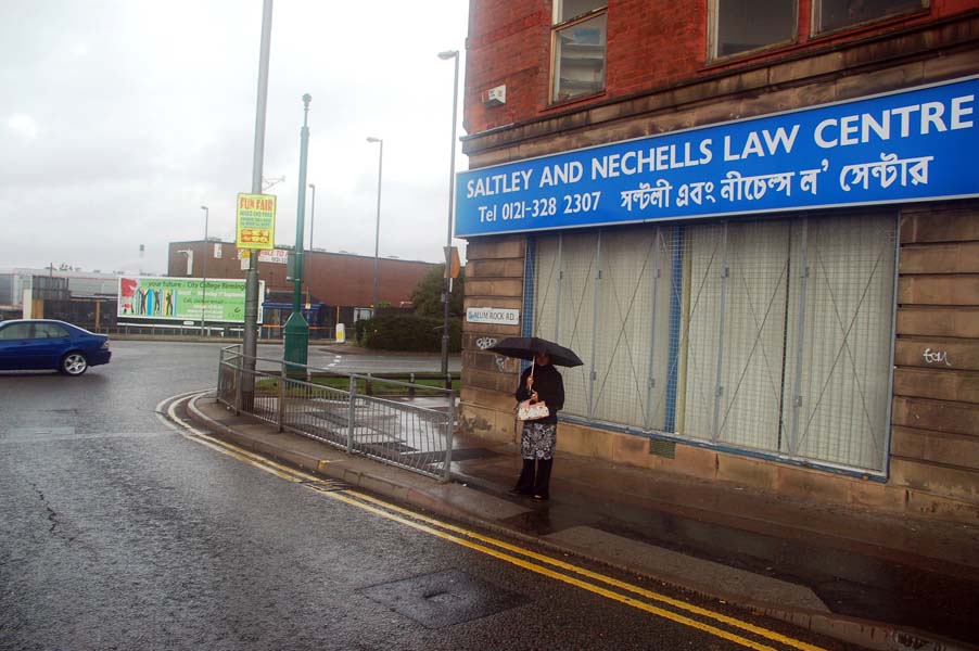 Lady with an umbrella, Alum Rock.