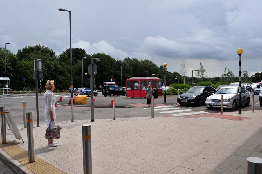 Red smoking shelter, the Queen Elizabeth hospital.