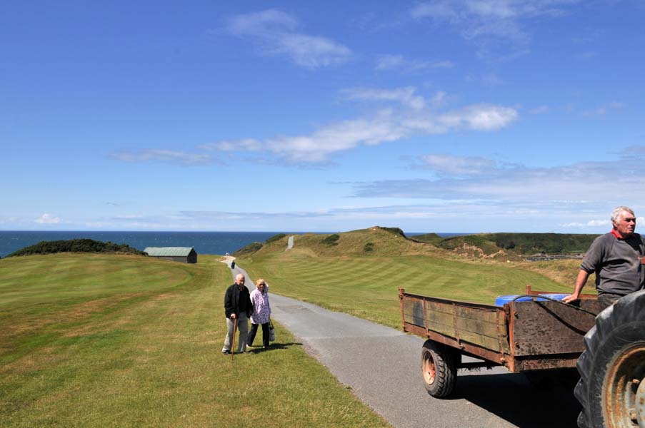 Man on a tractor.