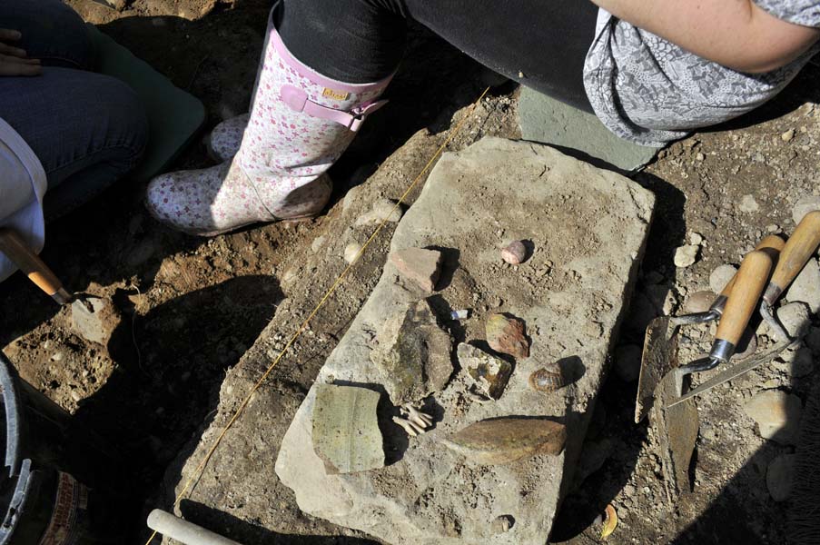 Pottery shards and teeth, archaeological dig, Polesworth Abbey